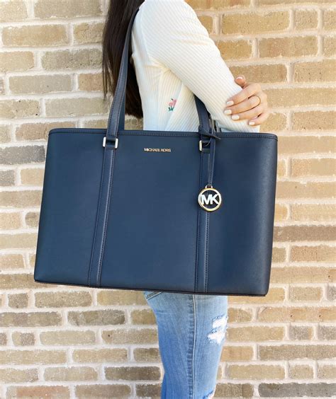 does a laptop fit in a michael kors bag|Michael Kors sady laptop bag.